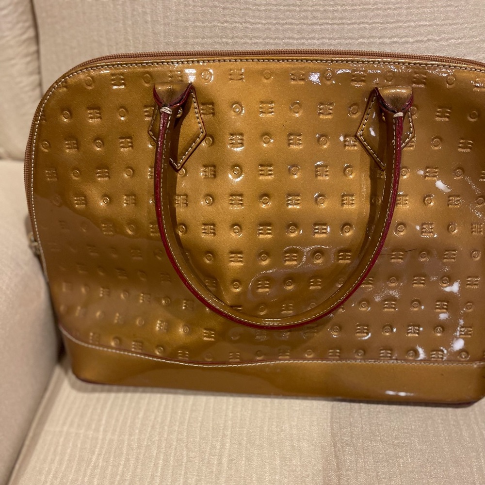 Genuine patent leather Arcadia Purse. Shiny gold